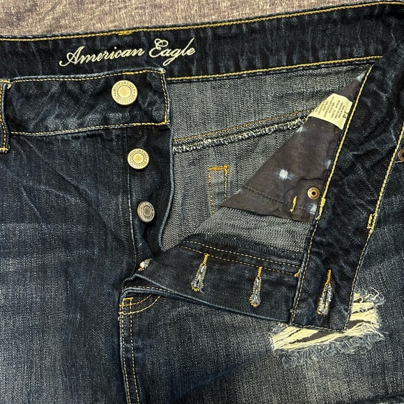 American Eagle Mini Skirt. Button fly. Distressed areas. Size 14. - Picture 2 of 4
